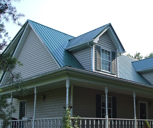 a home made with metal roofing and siding